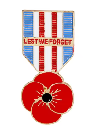 Pin with red poppy and 'Lest We Forget' text on a white background